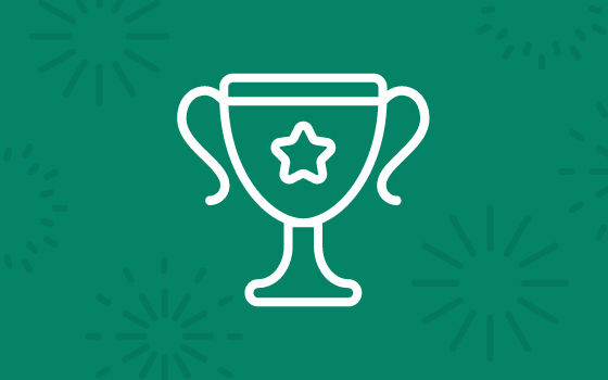Picture of a trophy outlined on a green background